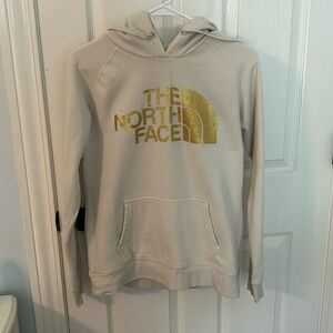 The North Face cream/gold sweatshirt